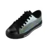 A pair of shoes with black laces and a blue background.