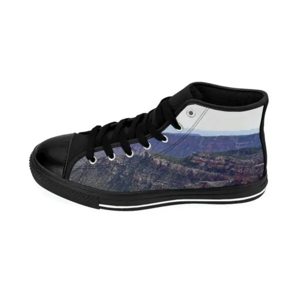 A pair of shoes with a picture of mountains.