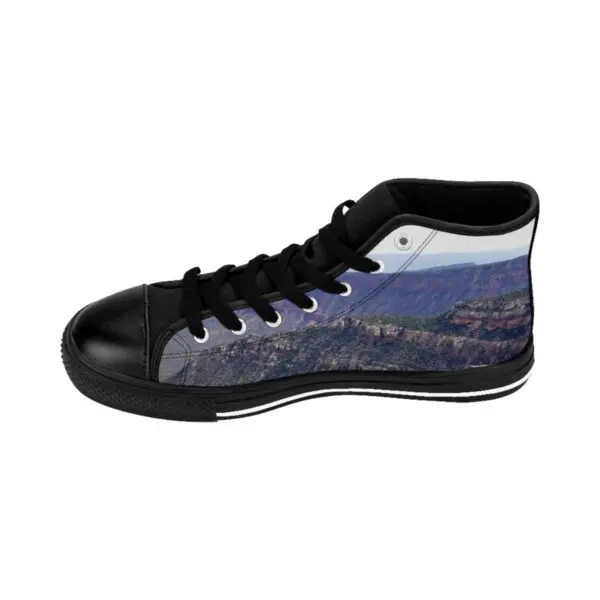 A pair of shoes with mountains on them.