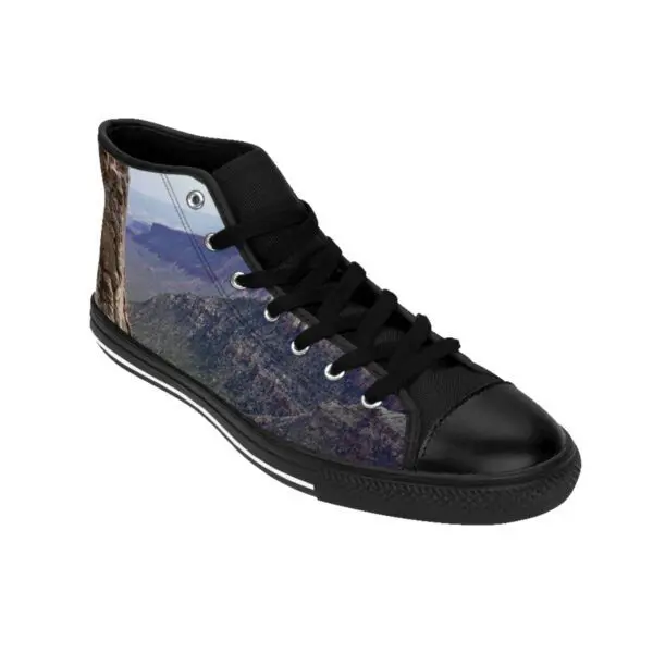 A pair of shoes with mountains on them.