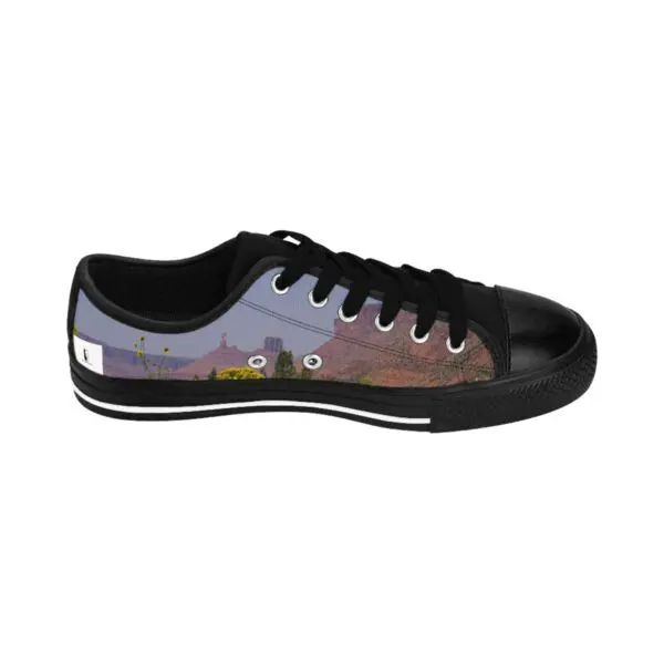 A black and white shoe with a picture of a sky