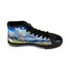 A pair of shoes with a picture of mountains and clouds.
