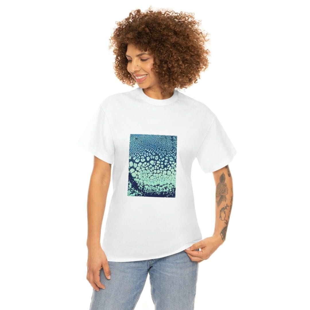A woman with curly hair wearing white t-shirt.