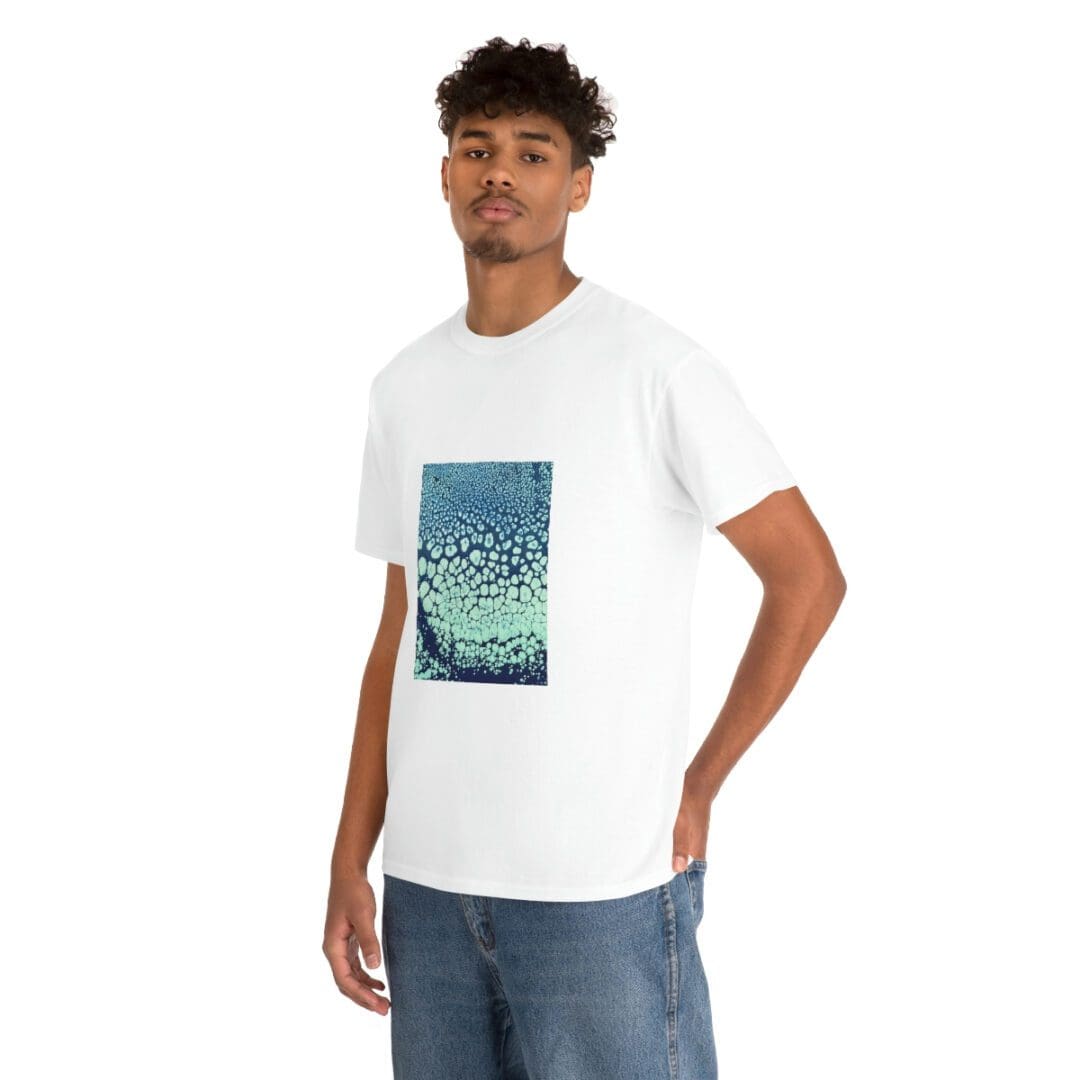 A man wearing a white t-shirt with a picture of a fish.