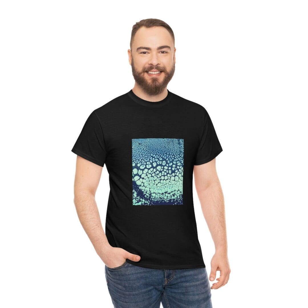 A man wearing a black t-shirt with a picture of water