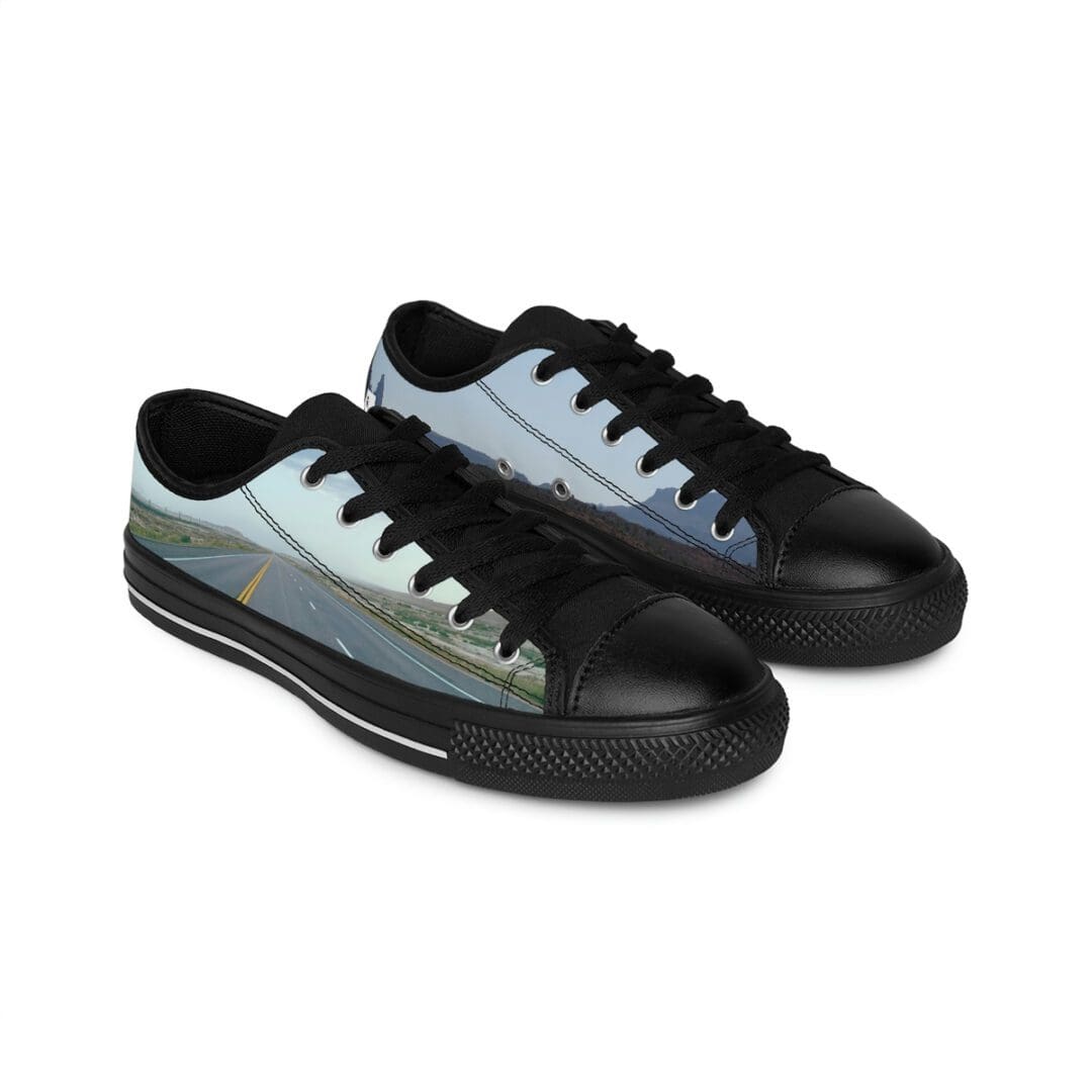 Black low-top sneakers with road landscape print