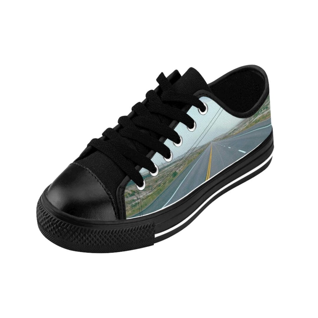 Black low-top sneaker displaying highway print