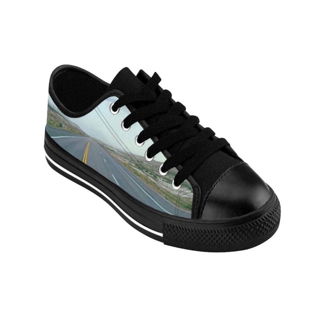 Black low-top sneaker with highway side print