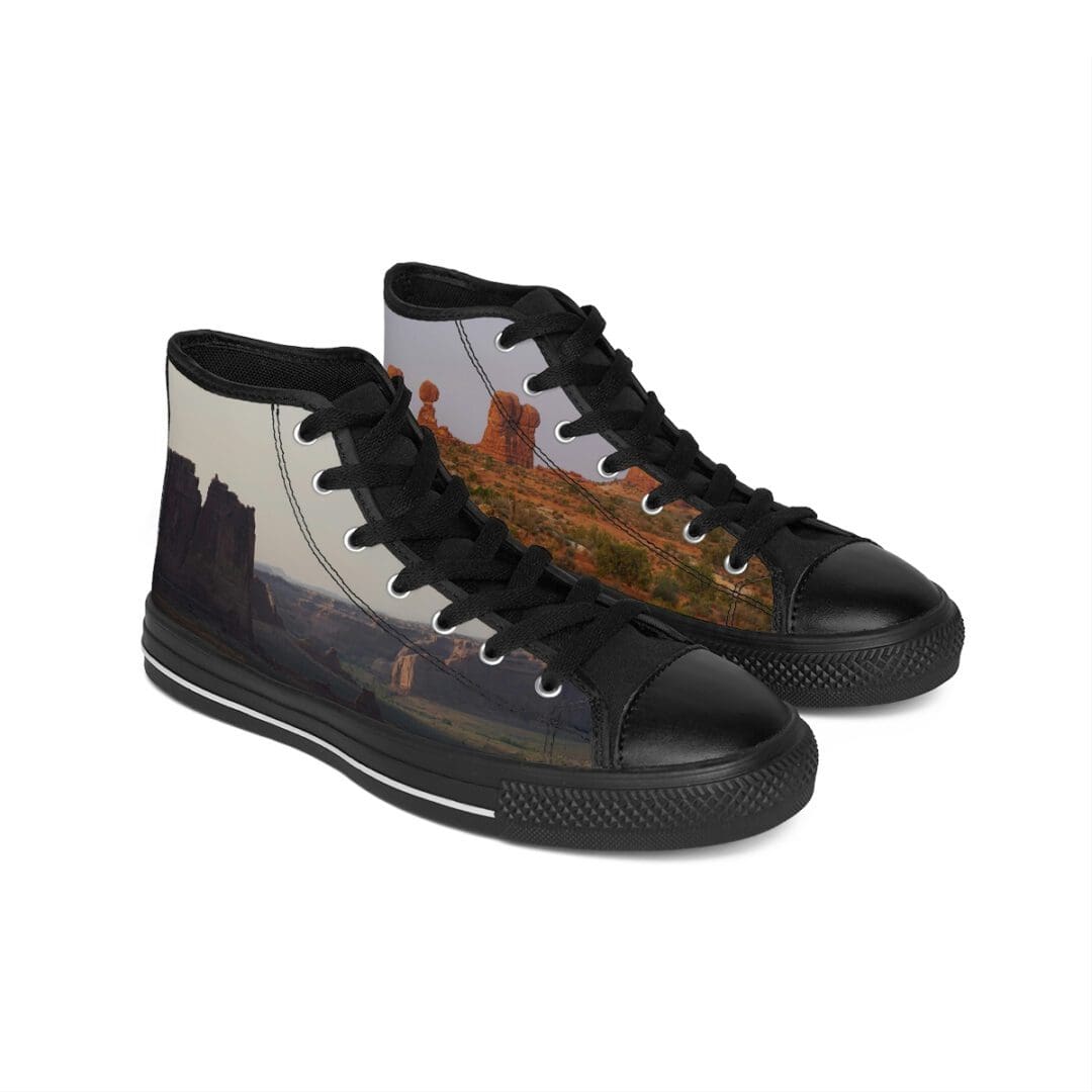 Black high-top sneakers with desert rock print