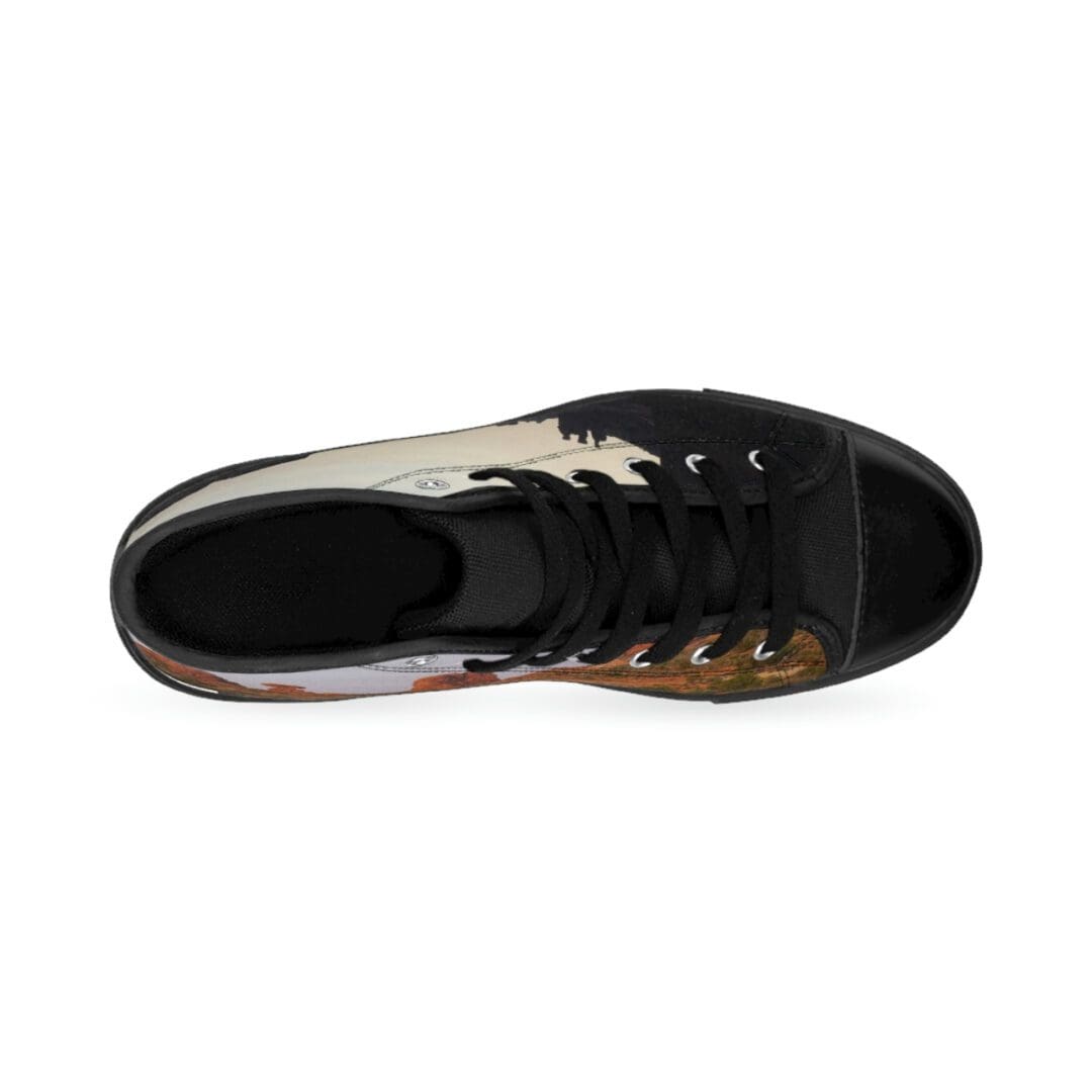 Black canvas sneaker top view with landscape print