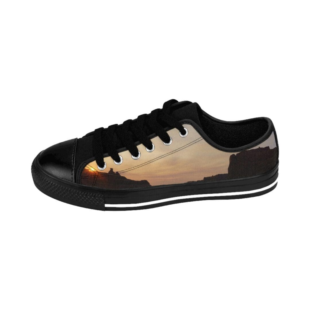 Sunset coastline silhouette on sneaker