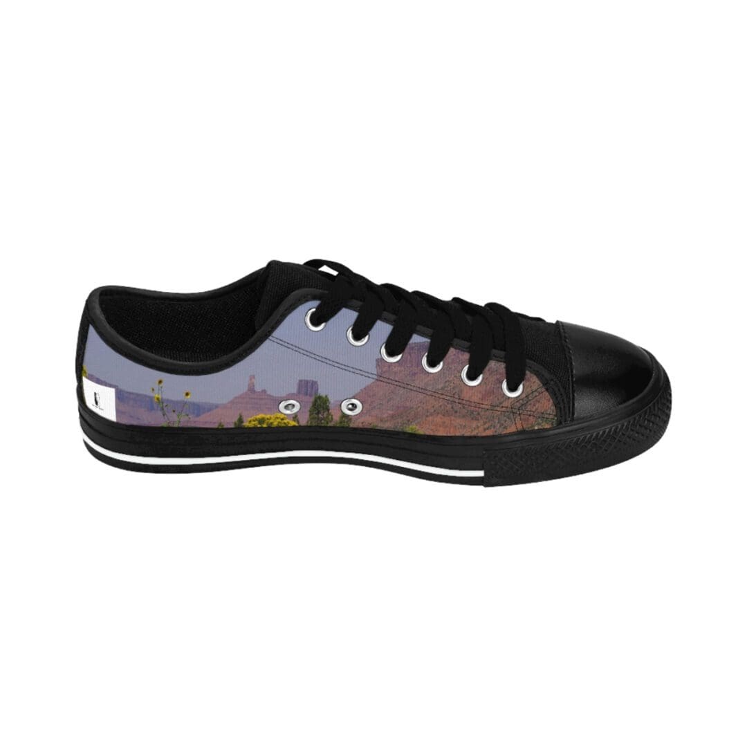 Black low-top sneaker with desert print