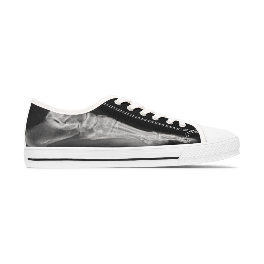 A pair of black and white sneakers on a white background